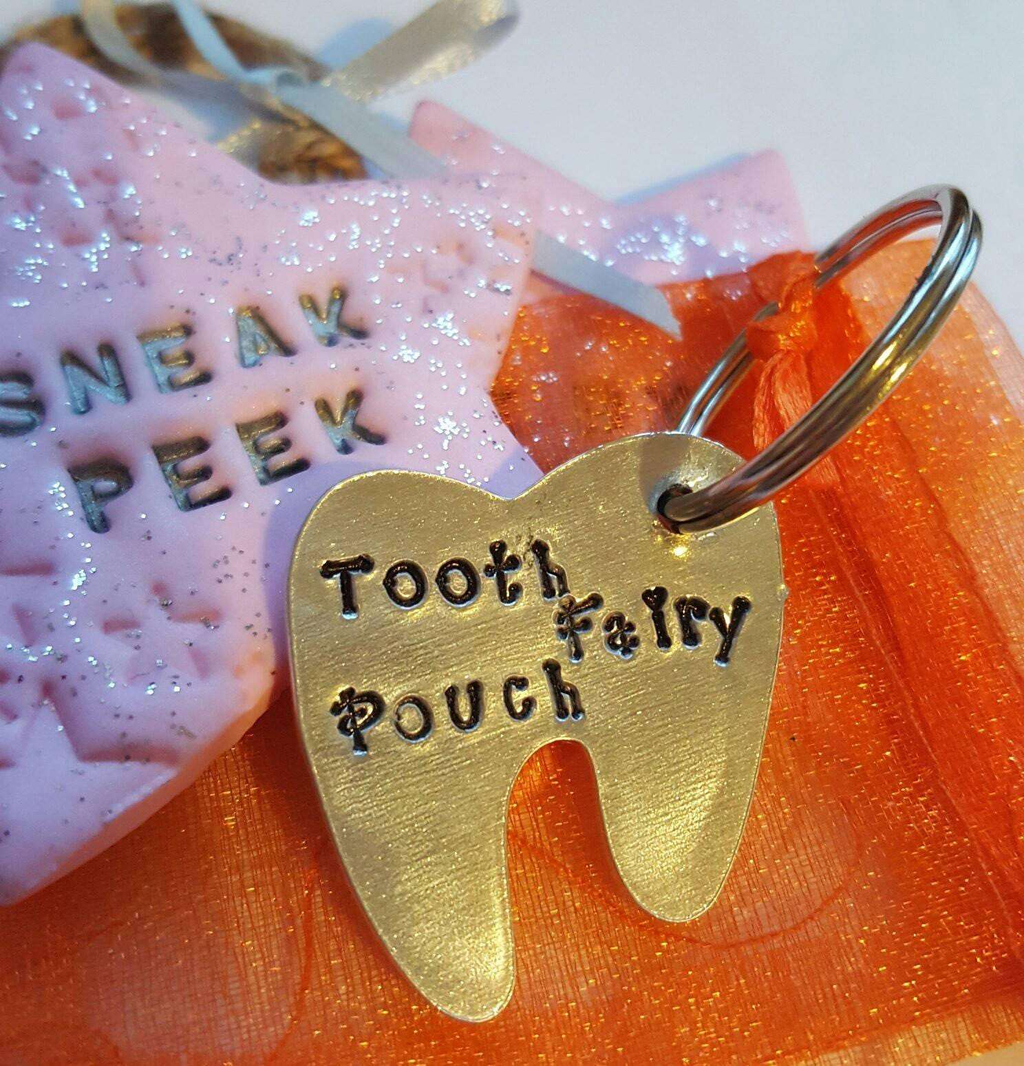 Tooth fairy pouch. Handstamped tooth with a small organza bag to hold the tooth